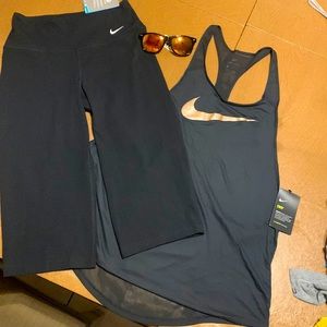 Nike set. Leggings are XS and Tank is a large.